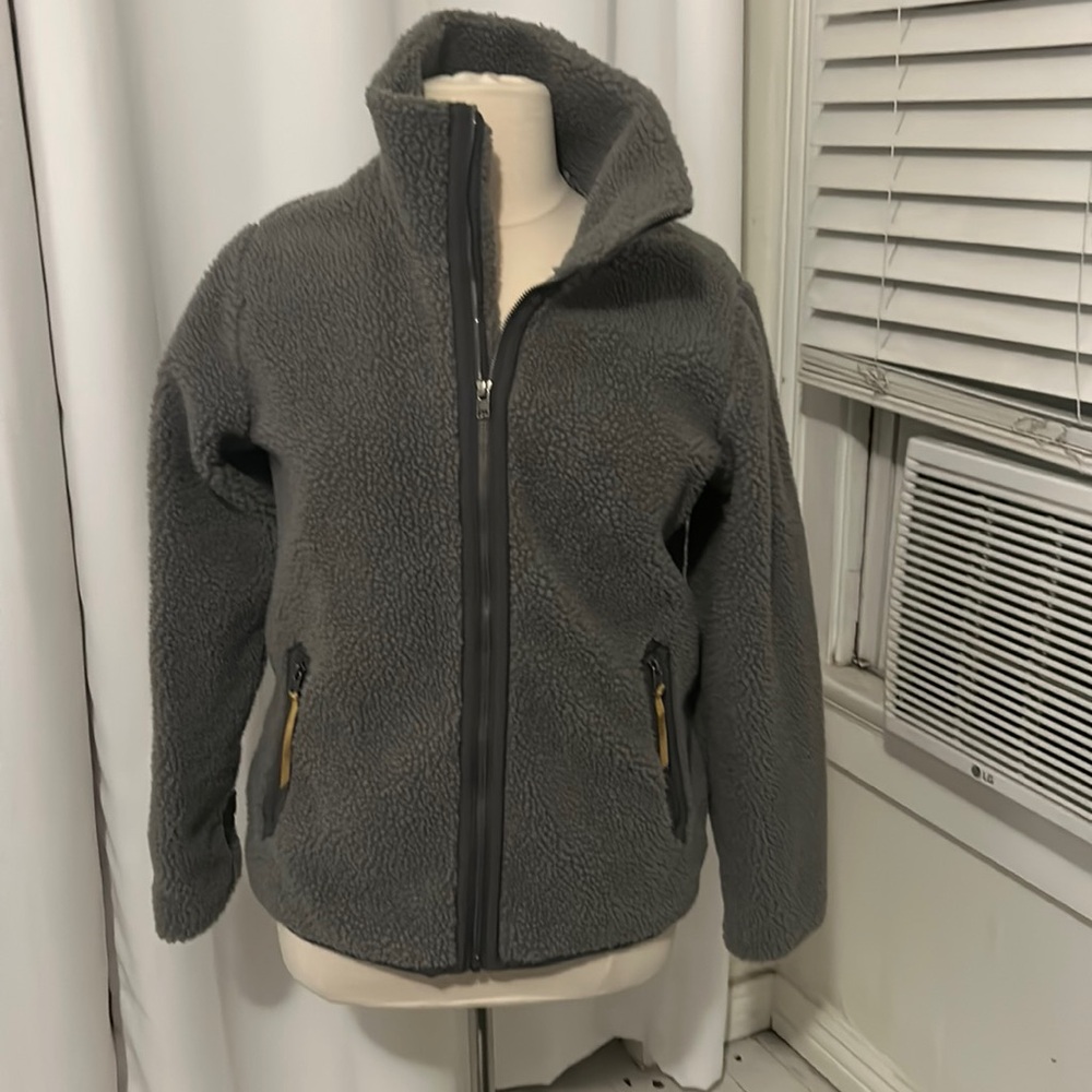 As new ‘worn wear’ fluffy jacket w pockets